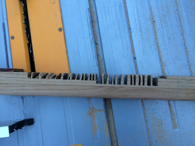 Notching the neck is nice and easy with the table saw, the remainder flies out with a hammer and chisel. The angle of the neck is just a guess for now, I'll cut it more precisely when the strings are on.