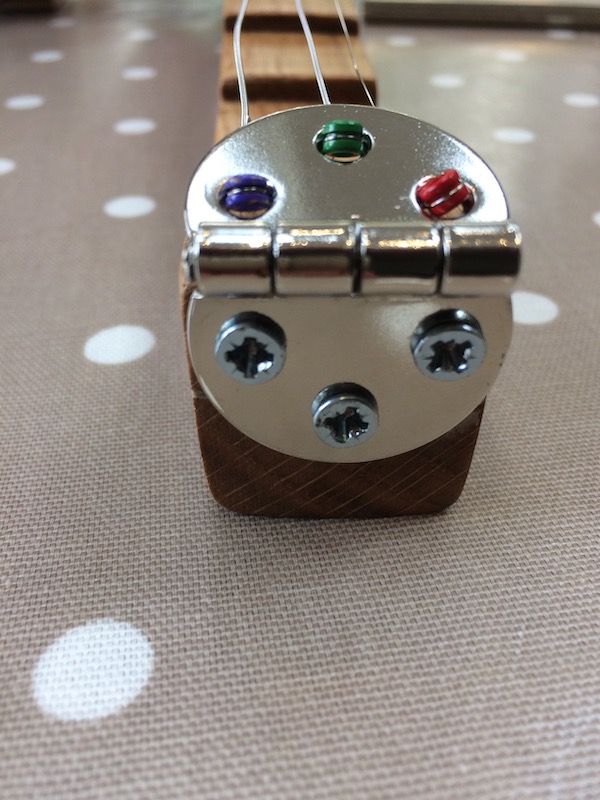 Hinge tailpiece fixed into position