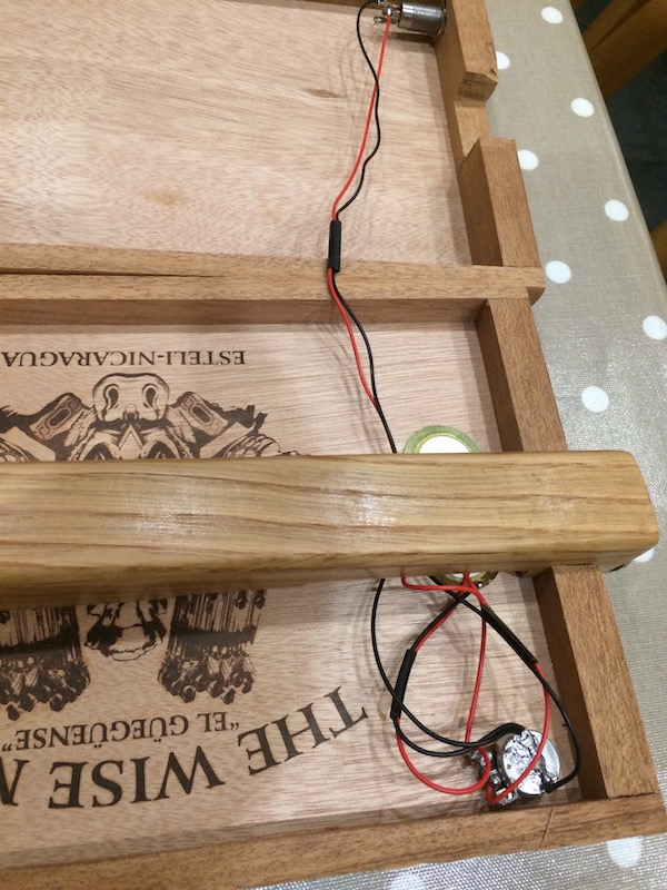 2 piezo's wired in parallel with one volume, thanks to [this article](https://www.cigarboxguitar.com/knowledge-base/cigar-box-guitar-piezo-wiring-diagrams/)